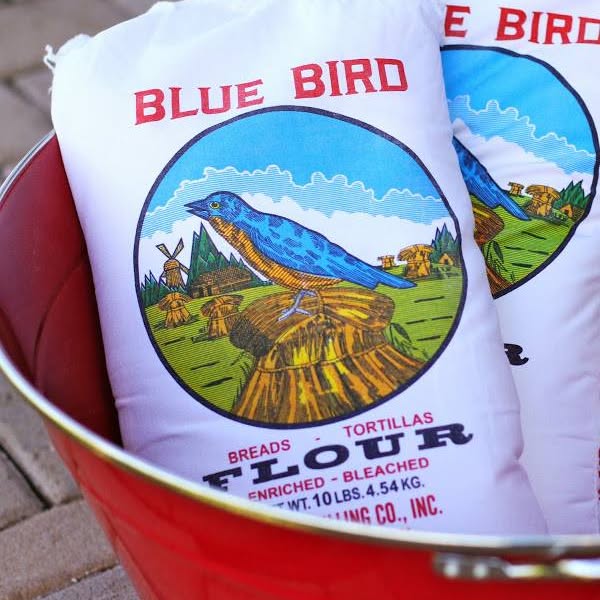 Blue Bird Native American Frybread Flour packed in a 5 lb Reusable Cotton Bag. Perfect for Breads, Donuts, Cakes, and Pastries.